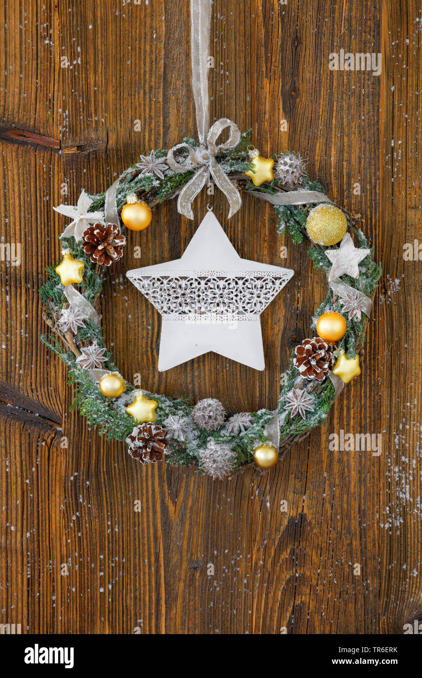with Advent wreath at a wooden door, Switzerland Stock Photo