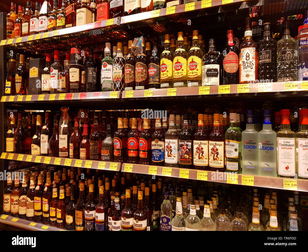 alcoholic drinks in a rack of a supermarket, Germany Stock Photo