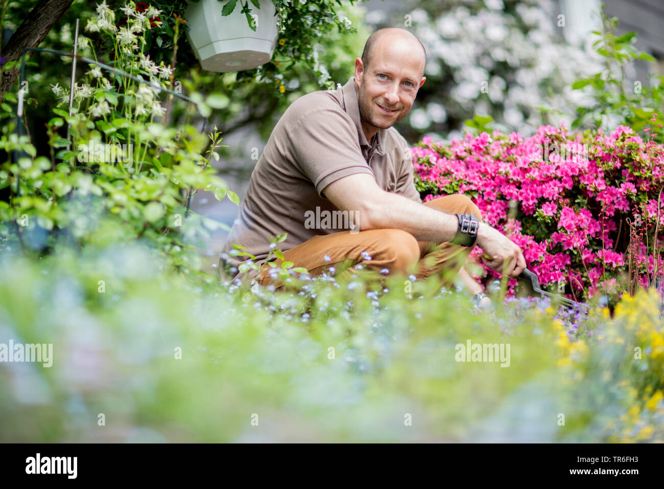 Man gardening hi-res stock photography and images - Alamy