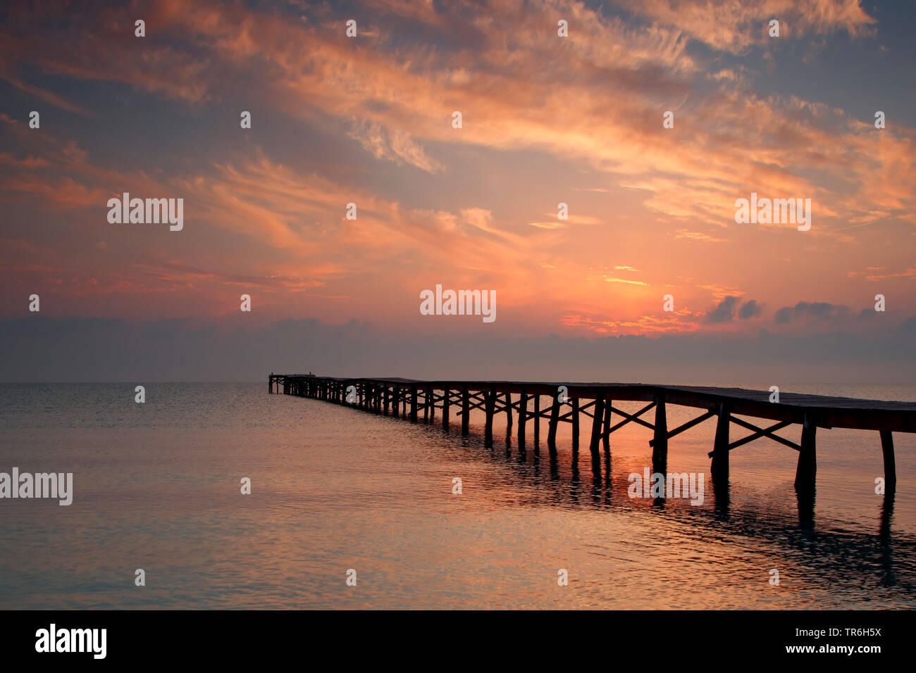 wooden stage at Playa de Muro at sunset, Spain, Balearic Islands, Majorca, Playa de Muro Stock Photo