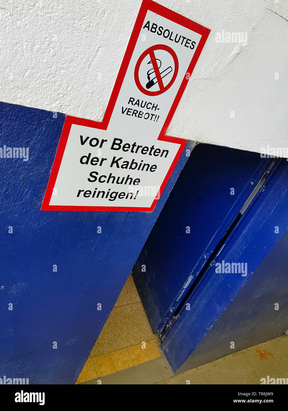 signs at the door to a changing room, no smoking, clean your shoes, Germany Stock Photo