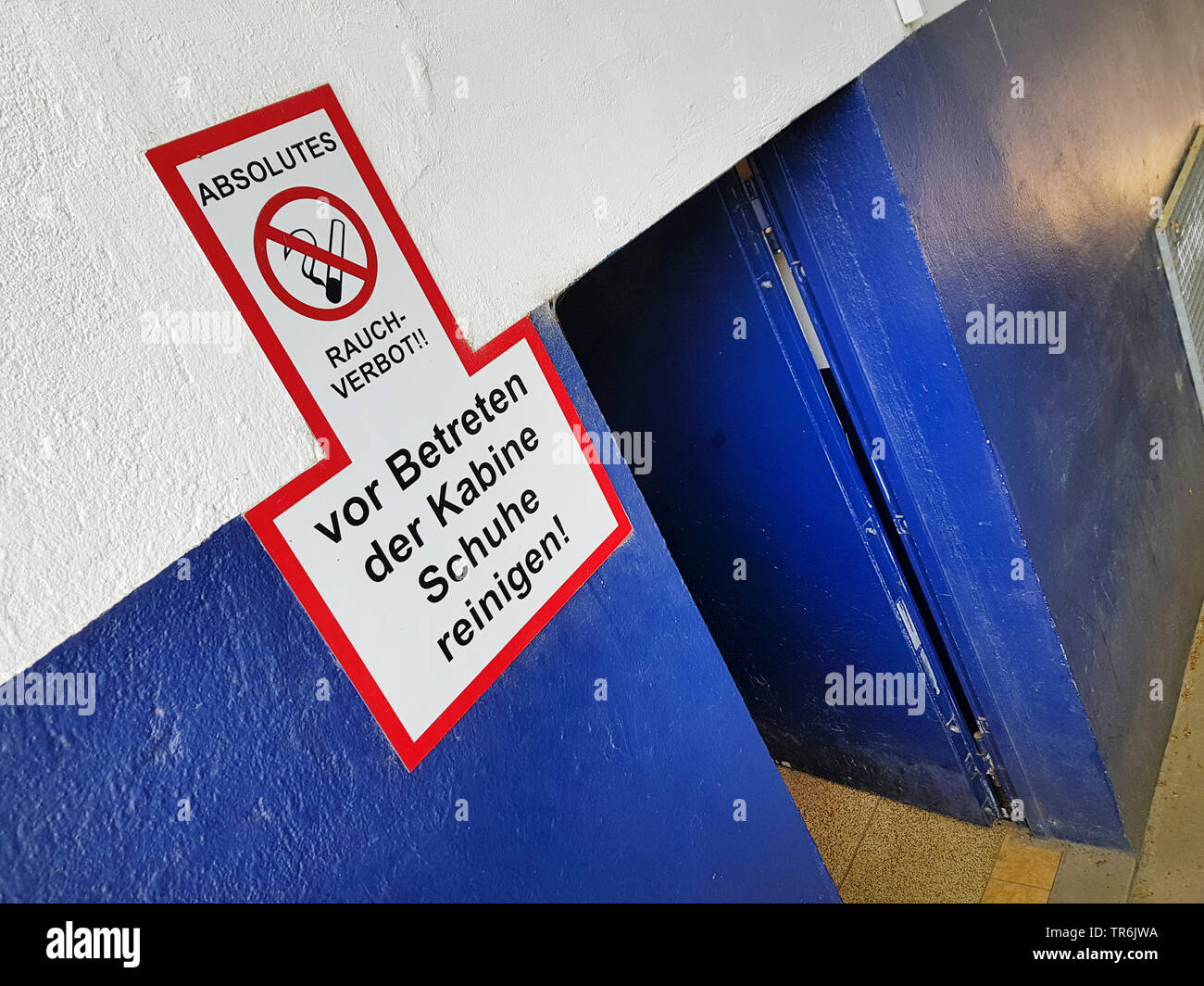 Signs At The Door To A Changing Room No Smoking Clean Your Shoes