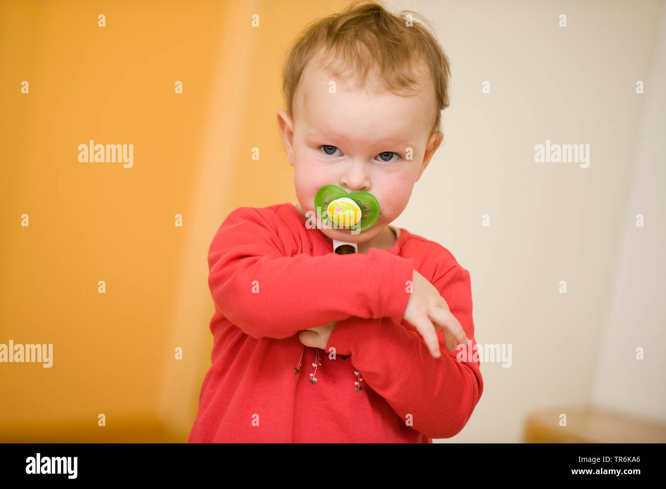 little defiant child with dummy Stock Photo