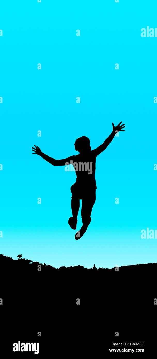 young girl jumping blue black, Germany Stock Photo - Alamy