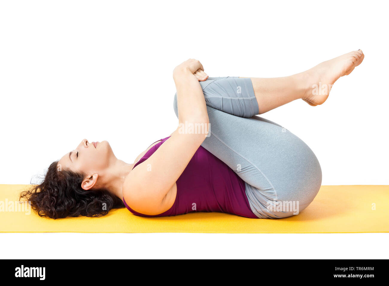 Woman Practising Yoga On A Yoga Mat Germany Stock Photo