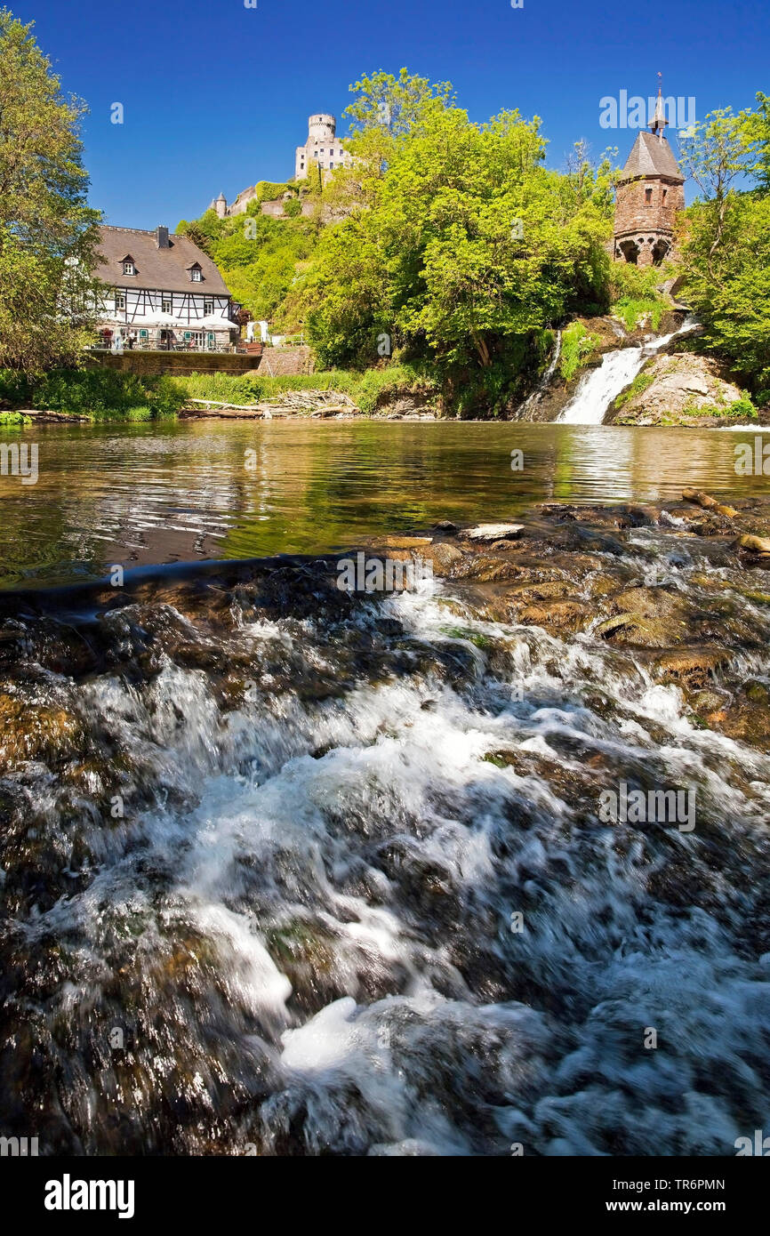 Pyrmont Mill at the waterfall on the Elzbach with the Pyrmont Castle in the background, Germany, Rhineland-Palatinate, Eifel, Roes Stock Photo