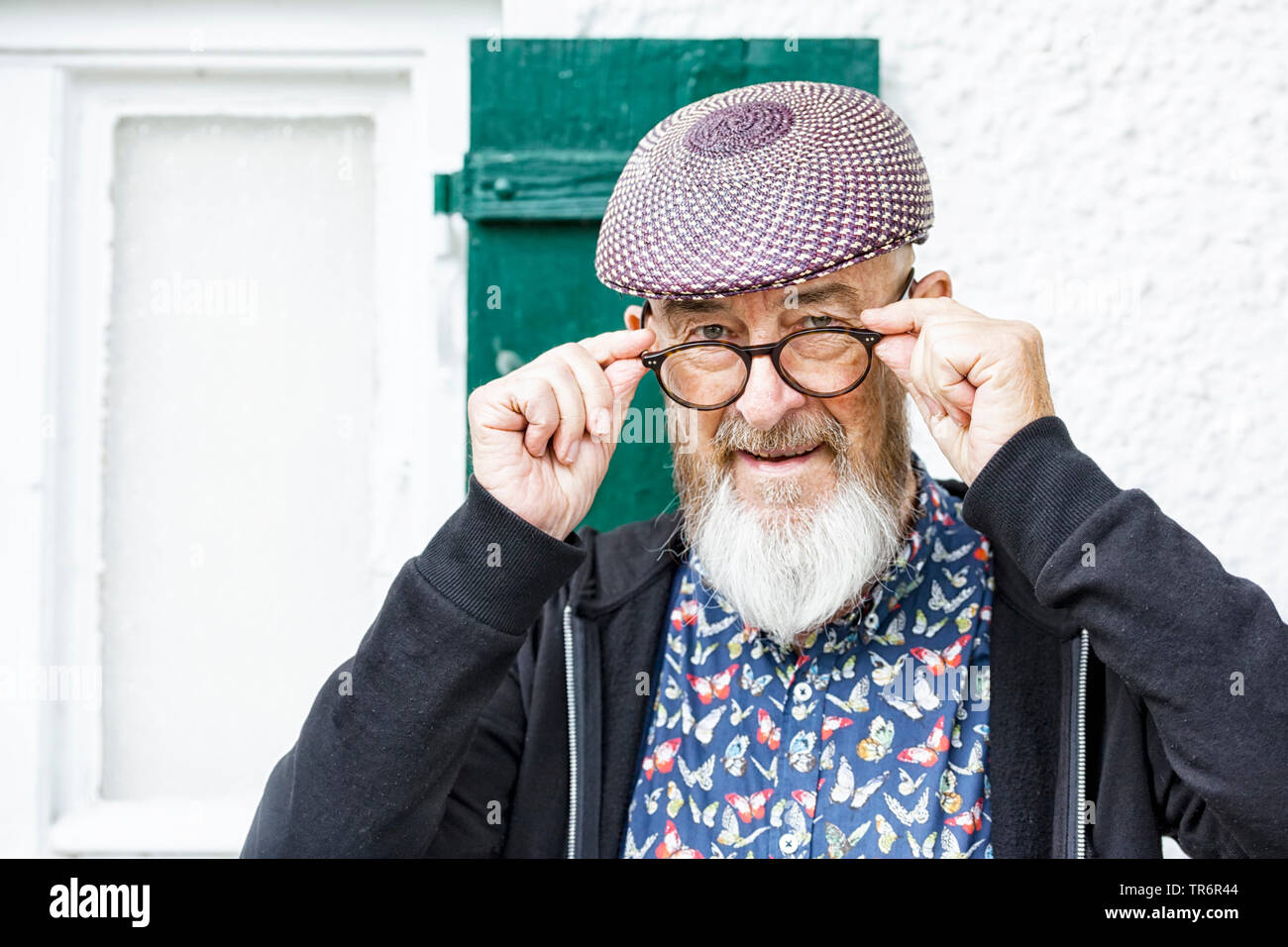 old man with peaked cap and beard outdoor, Germany Stock Photo - Alamy