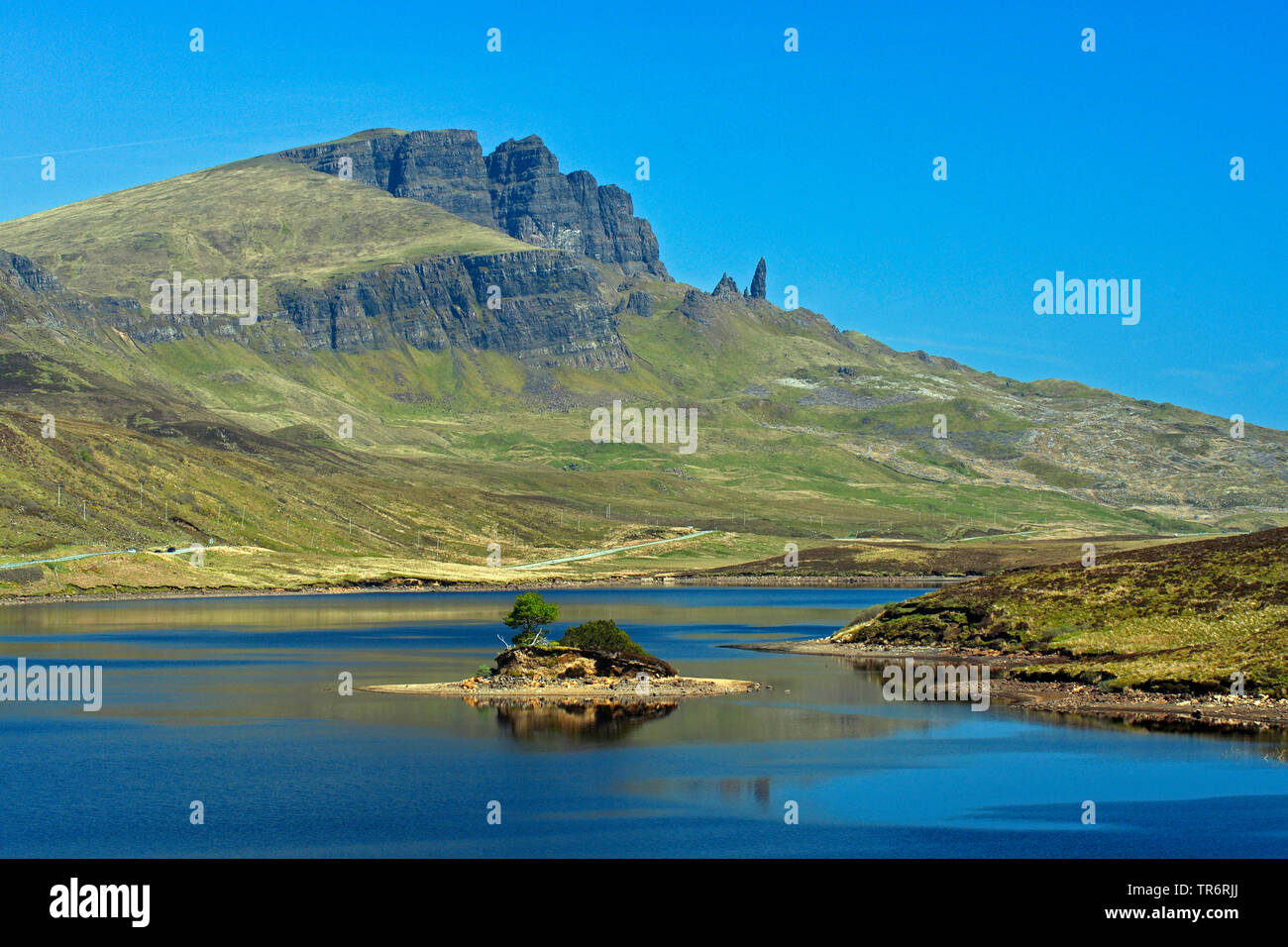 the Storr and Old Man of Storr, Loch Leathan in foreground, United Kingdom, Scotland, Isle of Skye Stock Photo