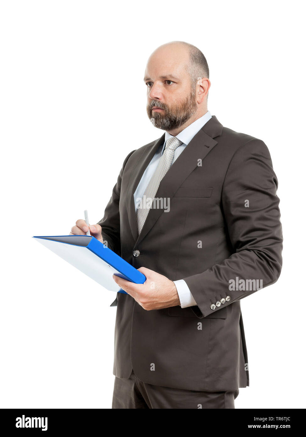 Middle-aged businessmann thinking about solutions and holding folder, Germany Stock Photo