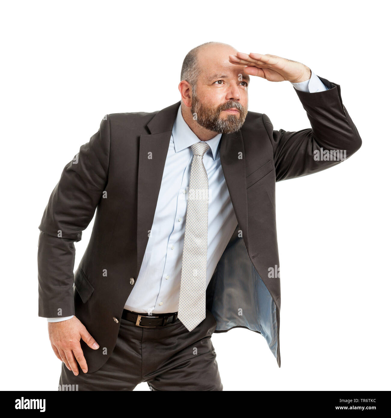 Middle-aged businessmann looking in the distance, Germany Stock Photo