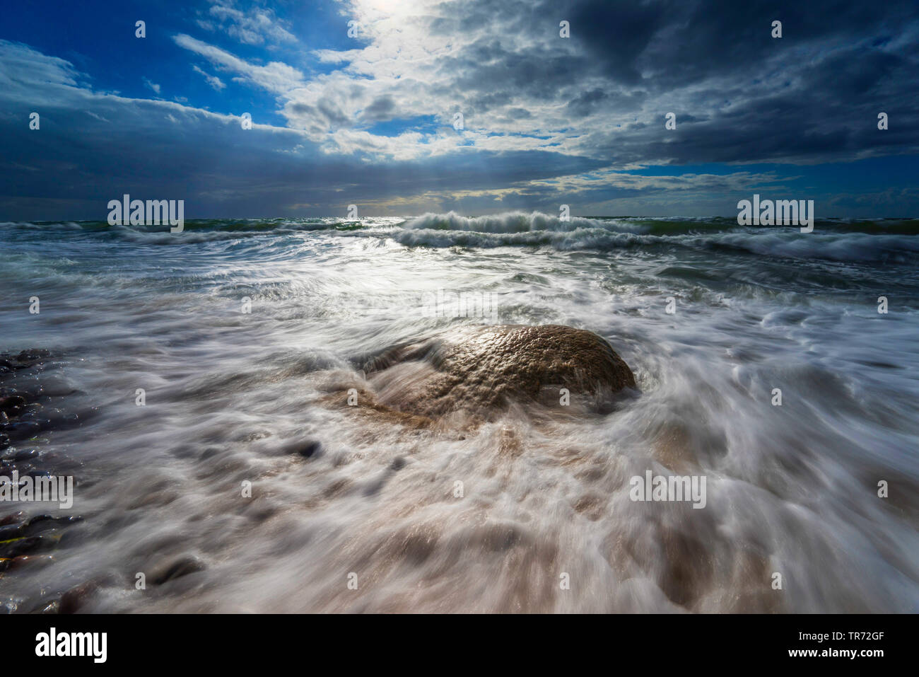 boulder in the surge of the Baltic Sea, Germany, Mecklenburg-Western Pomerania, Weststrand am Darss, Prerow Stock Photo
