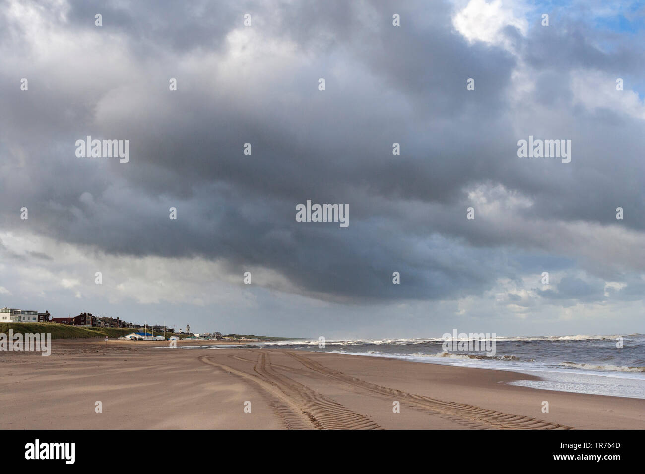 Dark sky over beach at Katwijk aan Zee in summer, Netherlands, South Holland, Katwijk aan Zee Stock Photo