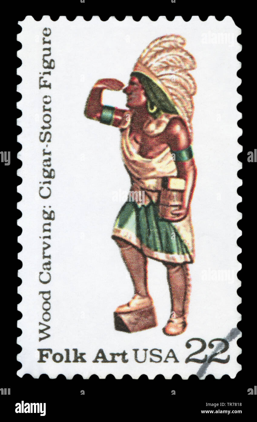 USA - CIRCA 1986: A stamp printed in USA shows the Cigar Store Figure from the series 'American Folk Art, Wood Carving', circa 1986 Stock Photo