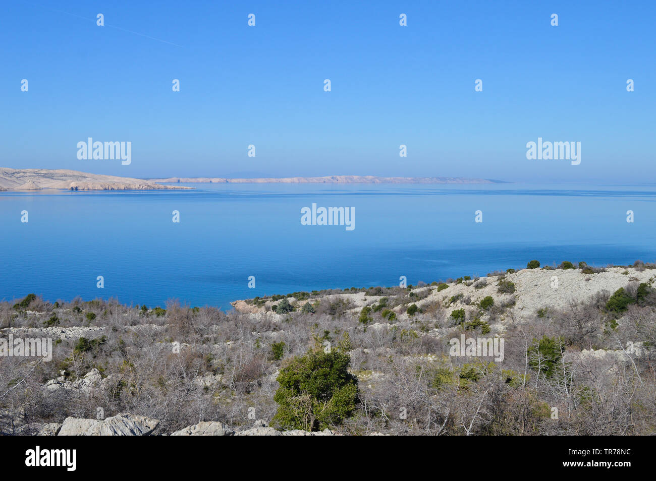 Scenic landscape at Northern Adriatic Sea, calm water, clear blue sky Stock Photo