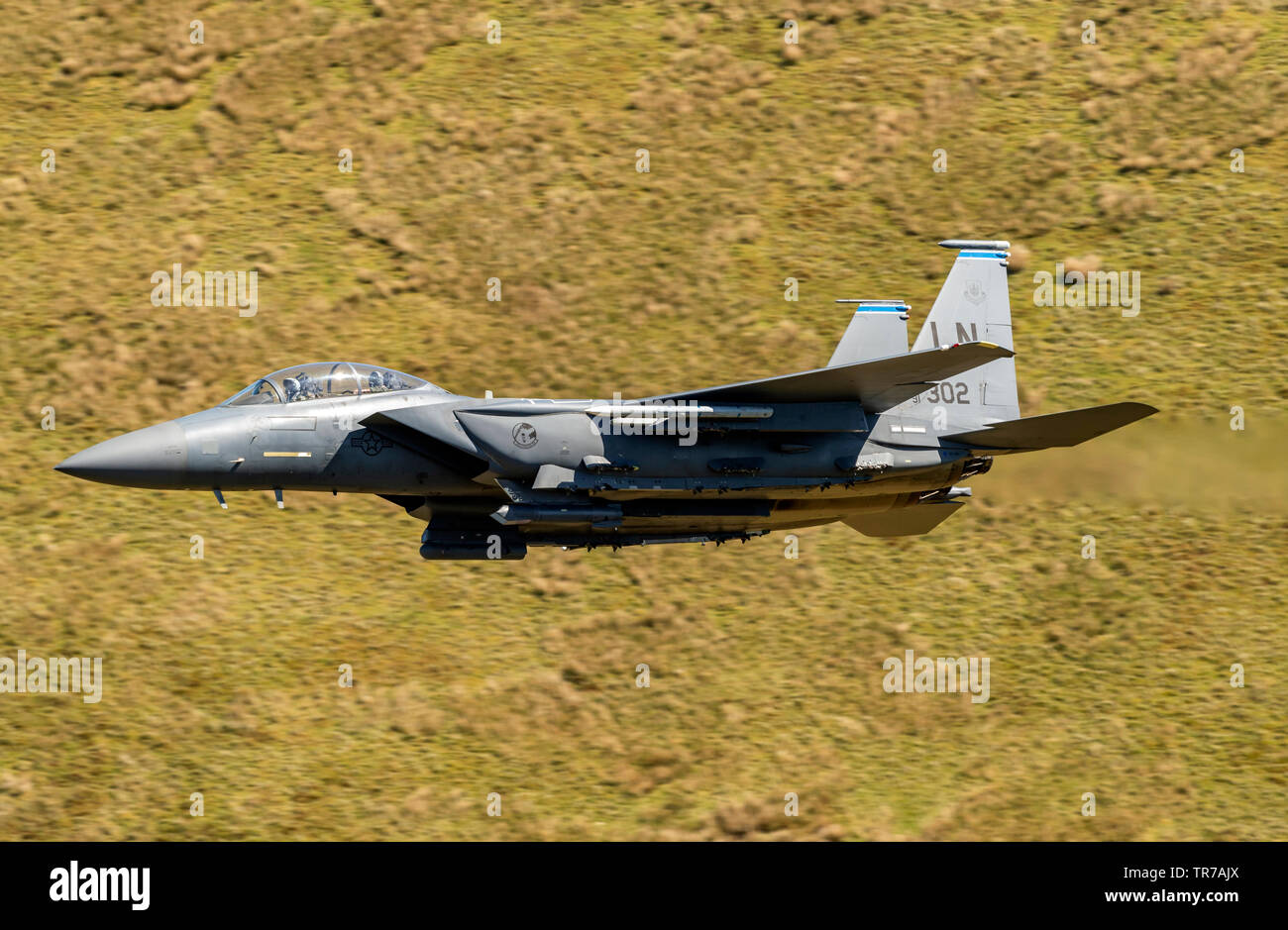 F-15E Strike Eagle flying low level in Wales UK Stock Photo