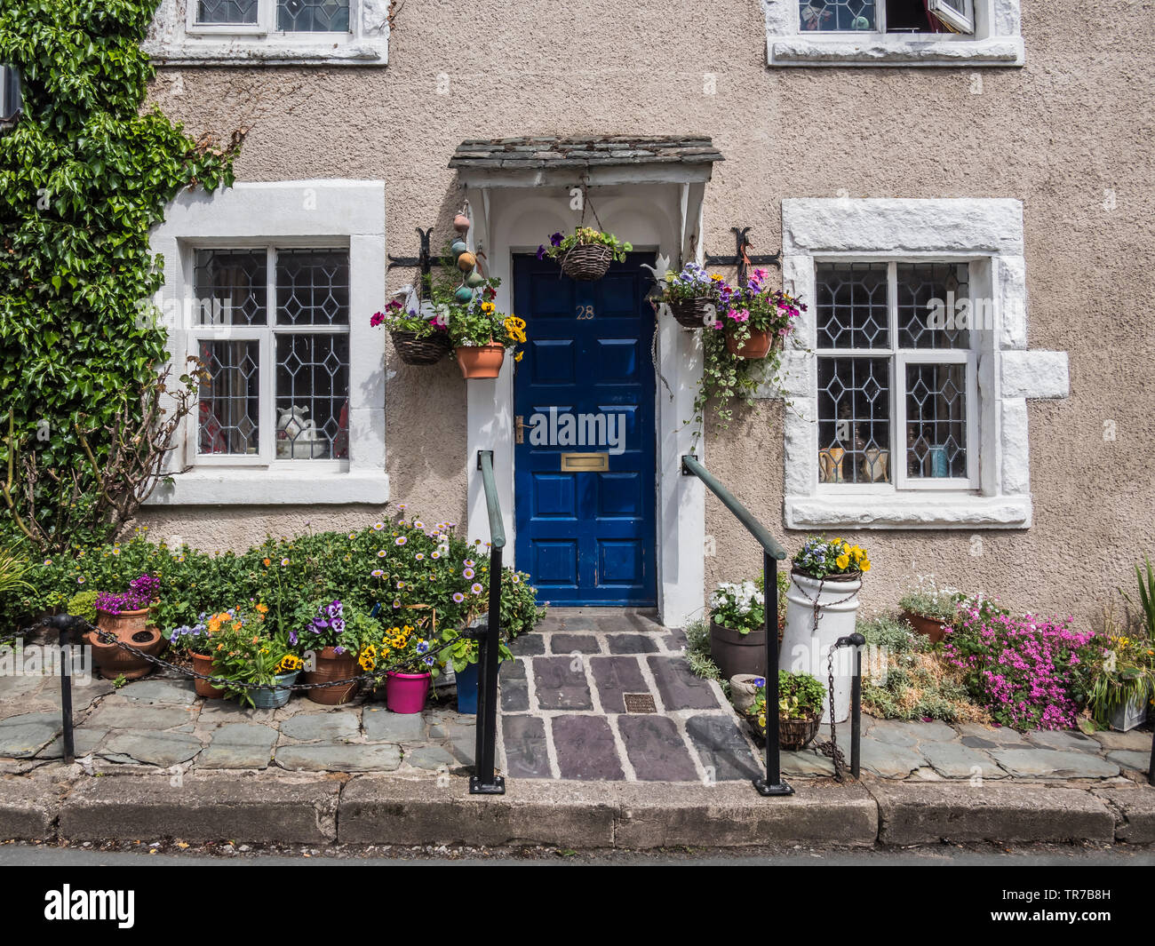 Welcome to my home with summer colours to our lovely charming old cottage Stock Photo