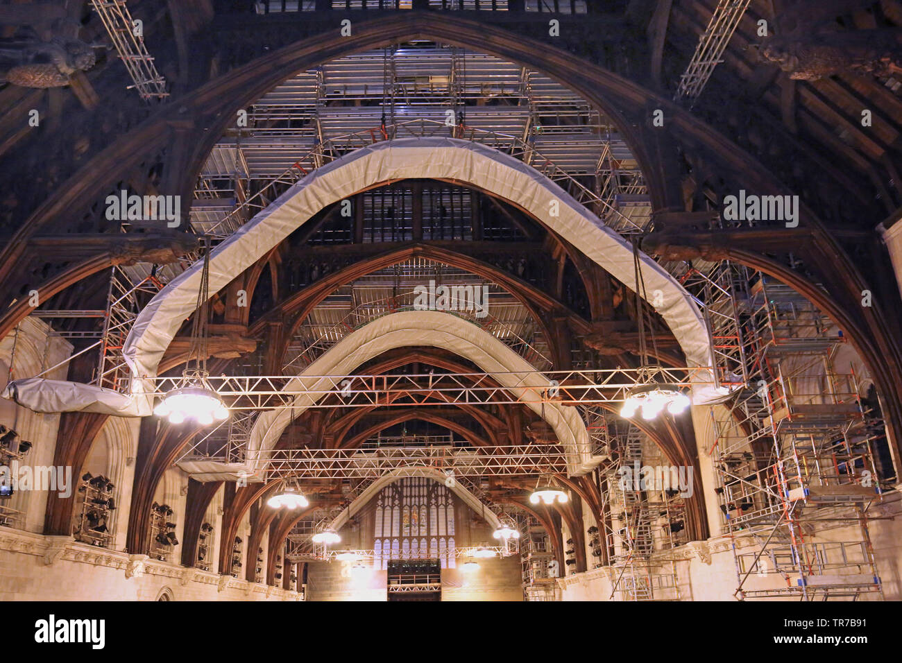 Hanging scaffolding gantries for the refurbishment of the medieval roof of Westminster Hall, London, the oldest part of Parliament built  in1393 Stock Photo