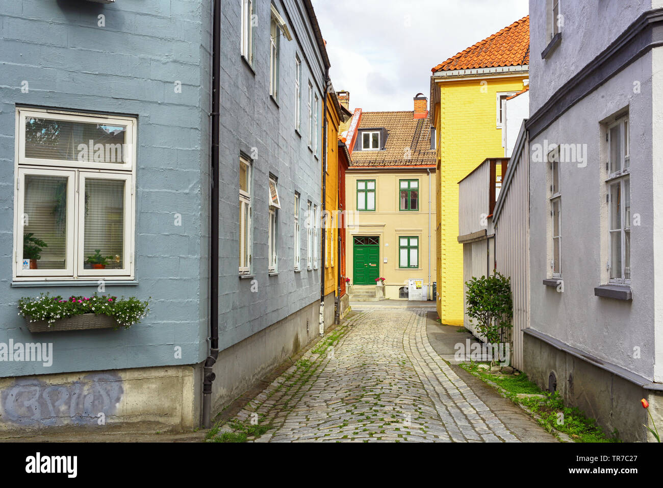 Trondheim, Norway 05/29/2019  : Bakklandet - popular touristic district in Trondheim with colorful wooden houses and shops Stock Photo