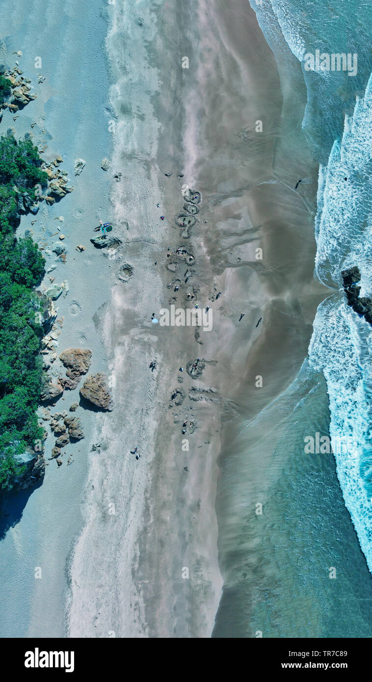 Overhead aerial view of Hot Water Beach in New Zealand North Island. Stock Photo
