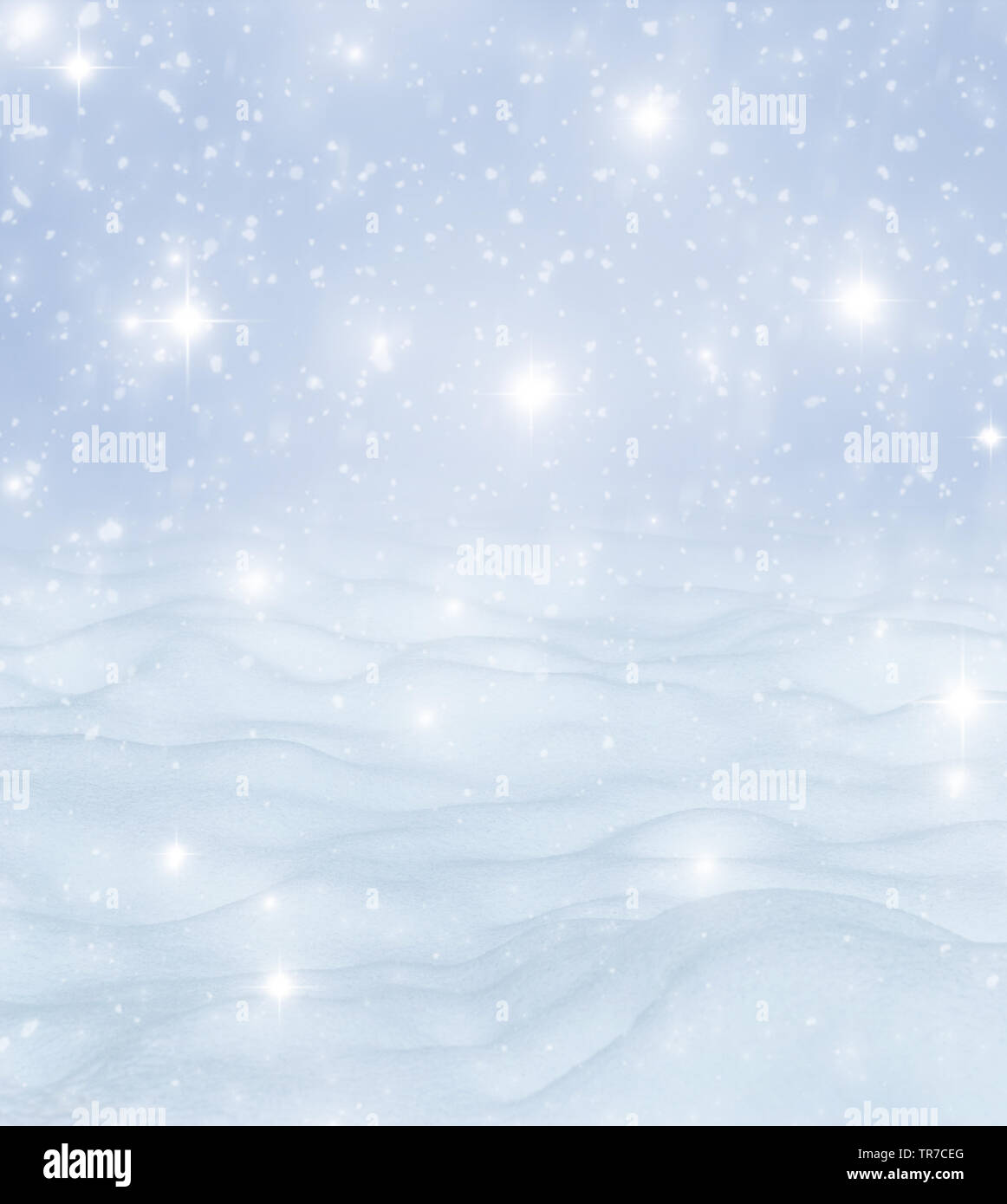Natural Winter Christmas background with blue sky, heavy snowfall, snowflakes in different shapes and forms, snowdrifts. Winter landscape with falling Stock Photo