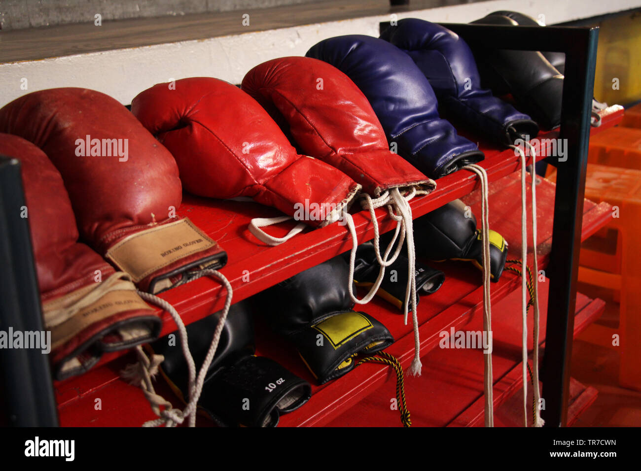 many boxing gloves put on the shelf prepared in a gym Stock Photo Alamy