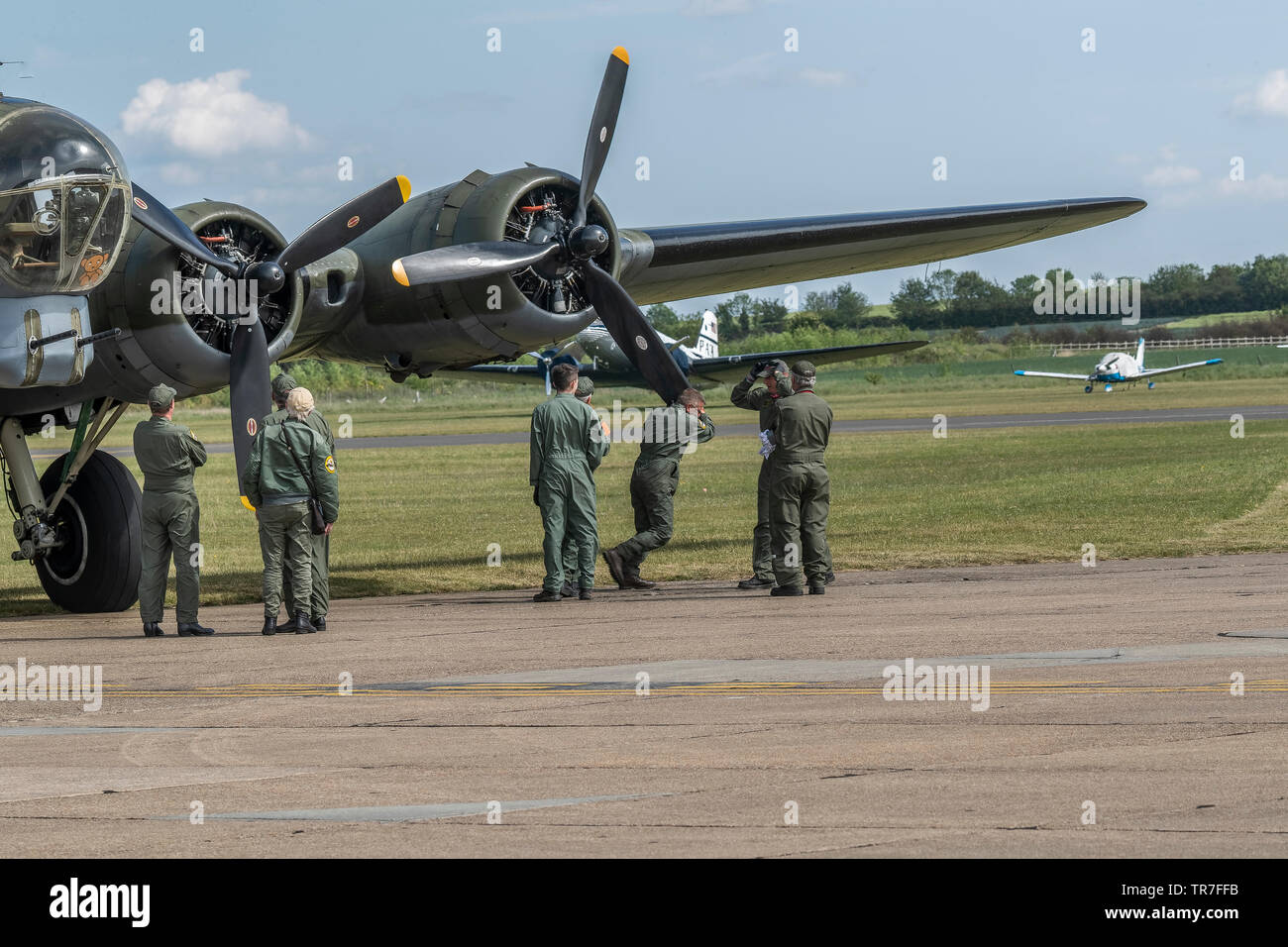 Engineers starting the engines of the B-17F Sally B or Memphis Belle ...