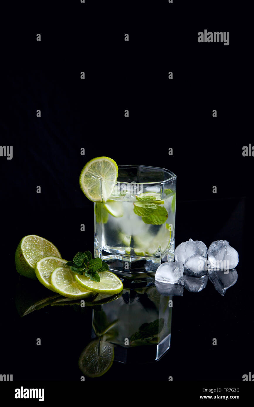 Mojito summer beach refreshing tropical cocktail in glass with soda