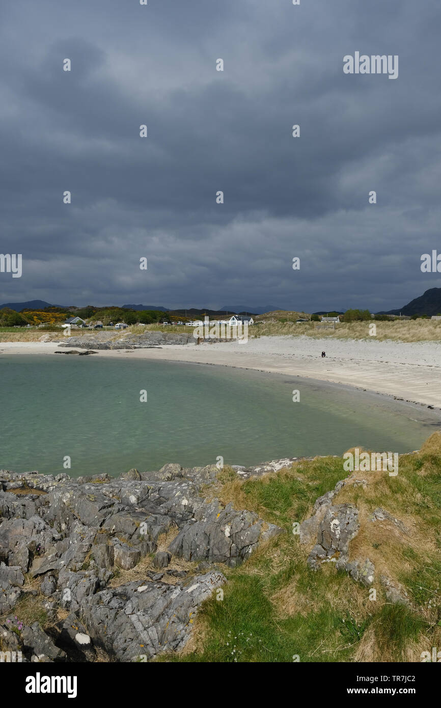 The white sandy beach at Arisaig on the North West coast of Scotland. Stock Photo