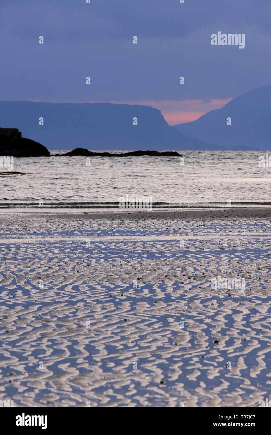 Looking out to the islands of Eigg and Rum in the Scottish Islands Stock Photo