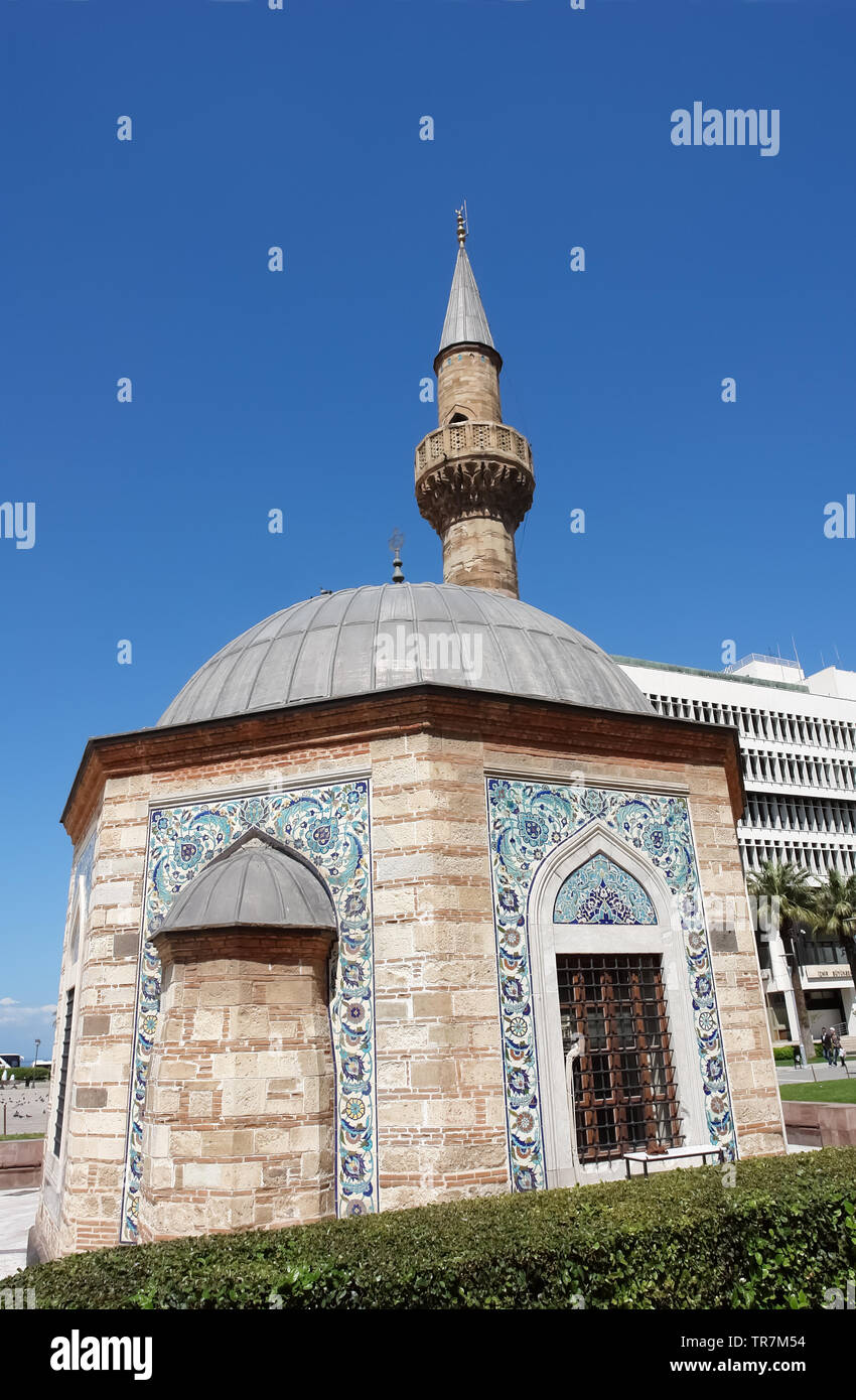 Izmir, Turkey - April 22, 2012: Old small mosque (Konak Camii) on the central Konak square in Izmir, Turkey. Stock Photo