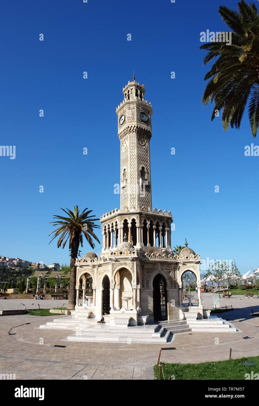 Izmir, Turkey - April 22, 2012: The Clock Tower (Saat Kulesi) on Konak Square in the center of Izmir on a sunny morning, Turkey. Stock Photo