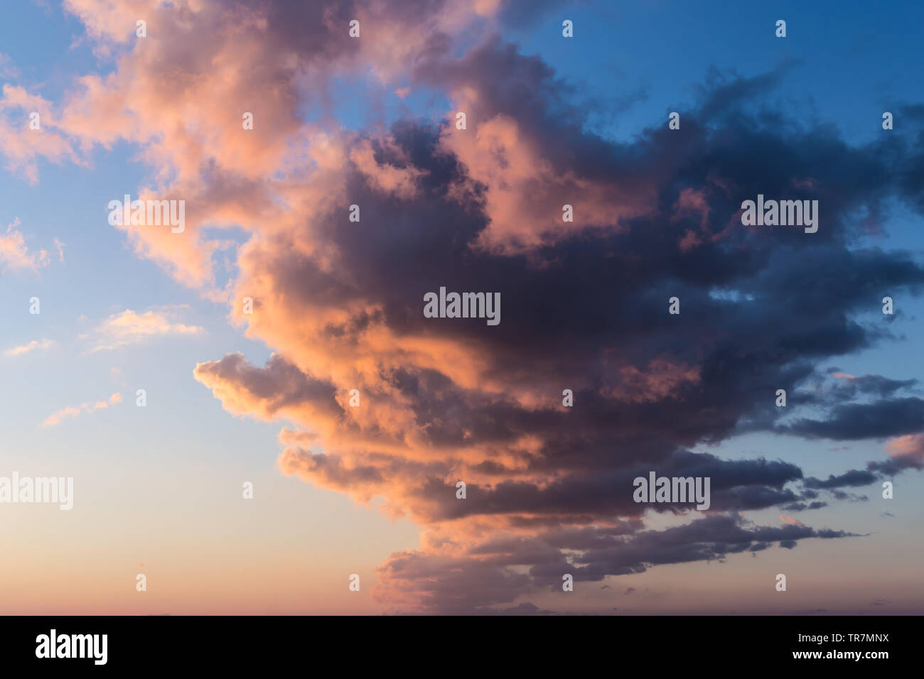 Dramatic sunset sky with orange colored clouds Stock Photo - Alamy