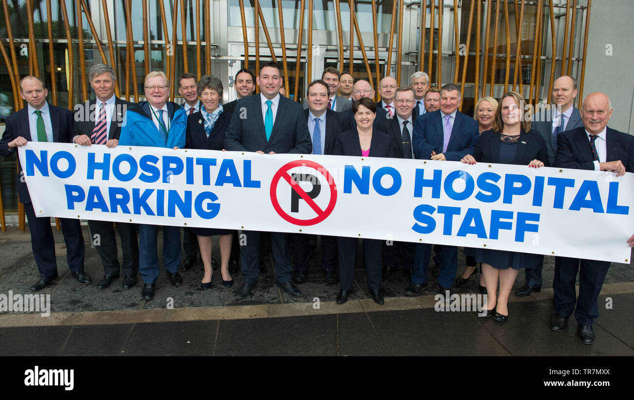 Edinburgh, UK. Scottish Conservatives launch a campaign to improve parking at hospitals across Scotland.  Shadow health secretary Miles Briggs joins other Scottish Conservative MSPs in demanding a review of parking for staff, patients and visitors. Pictured: (left-right) Donald Cameron; Edward Mountain; Jackson Carlaw; Murdo Fraser; Liz Smith; Maurice Golden; Miles Briggs; Jamie Halco Johnston; Brian Whittle; Liam Kerr; Ruth Davidson; Alexander Stewart; Maurice Corrie; Jamie Green; Jeremy Balfour; Rachel Hamilton, Michelle Ballantyne; Gordon Lindhurst; John Scott. Colin Fisher/Alamy Live News Stock Photo