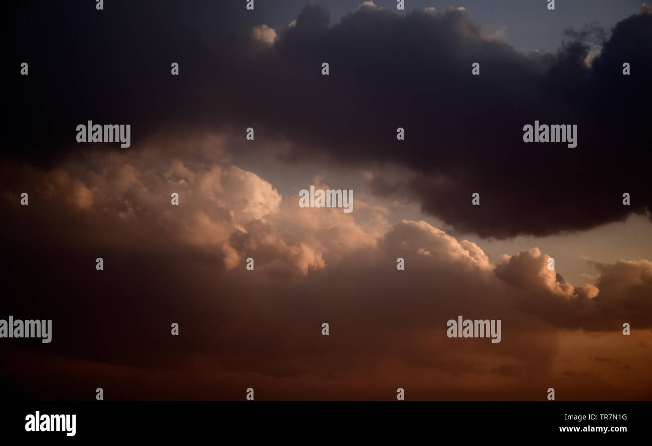 Dramatic sunset sky with orange clouds Stock Photo - Alamy