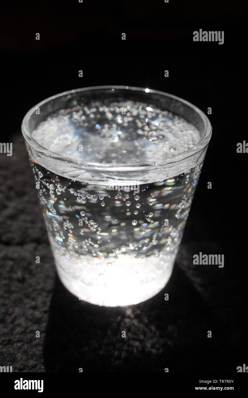 glass with clean cold drinking water with shine bubbles Stock Photo Alamy