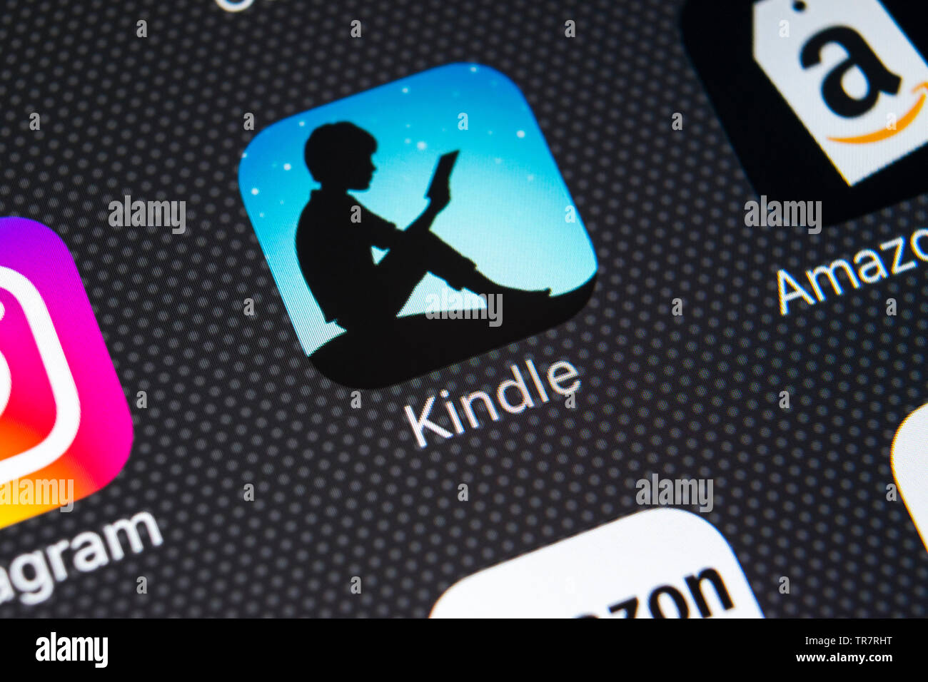 Sankt-Petersburg, Russia, February 21, 2018: Amazon Kindle application icon on Apple iPhone X screen close-up. Amazon Kindle app icon. Amazon kindle a Stock Photo