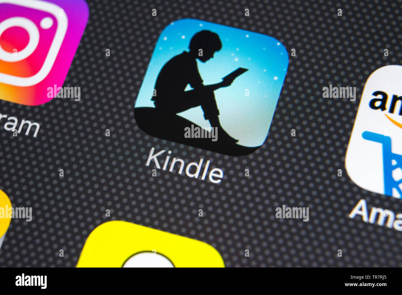 Sankt-Petersburg, Russia, February 21, 2018: Amazon Kindle application icon on Apple iPhone X screen close-up. Amazon Kindle app icon. Amazon kindle a Stock Photo