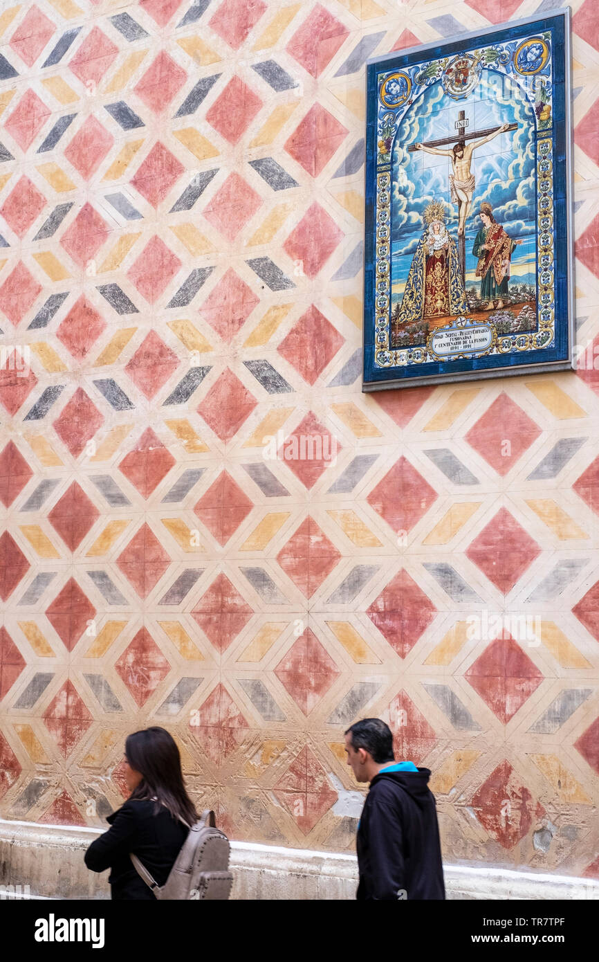 Detail of tiling on the walls of a church (Iglesia de san Juan Bautista) in the old town of Malaga, Spain Stock Photo