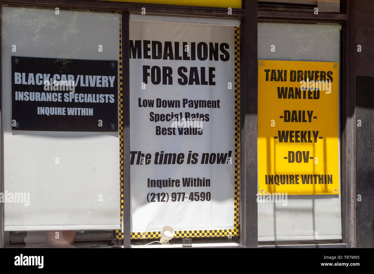 A taxi medallion broker’s offices in New York on Sunday, May 26, 2019. Following an investigation by the New York Times the NYS Attorney General has launched a probe into the taxi medallion business and its loan practices. (© Richard B. Levine) Stock Photo