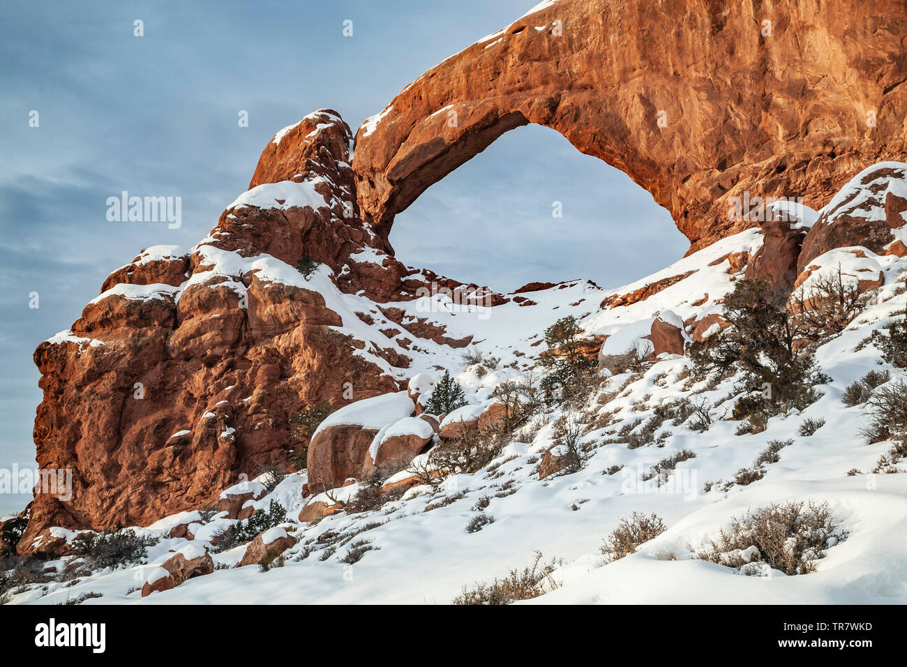 South Window Arch under snow, The Windows, Arches National Park, Moab, Utah USA Stock Photo