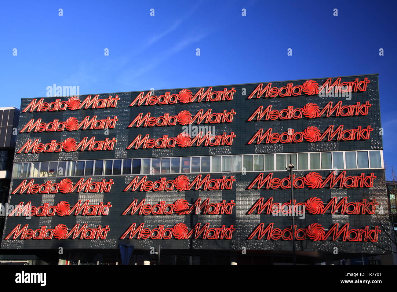 Media Markt Sign with Big Letter M in Front of a Store Editorial Image -  Image of center, concept: 209721785