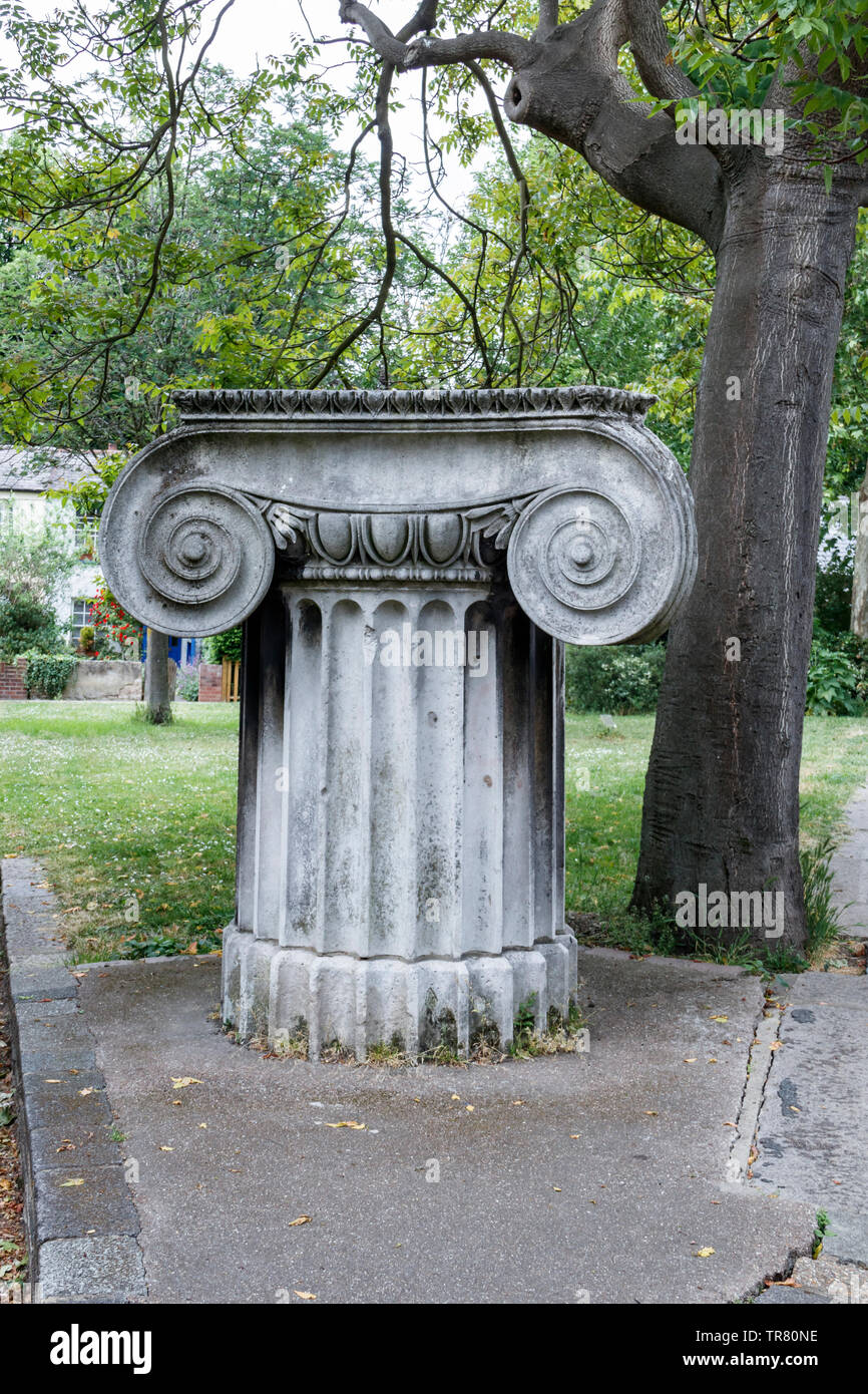 The capital of an ionic pillar outside Vestry House museum in Church Lane, Walthamstow, London, UK Stock Photo