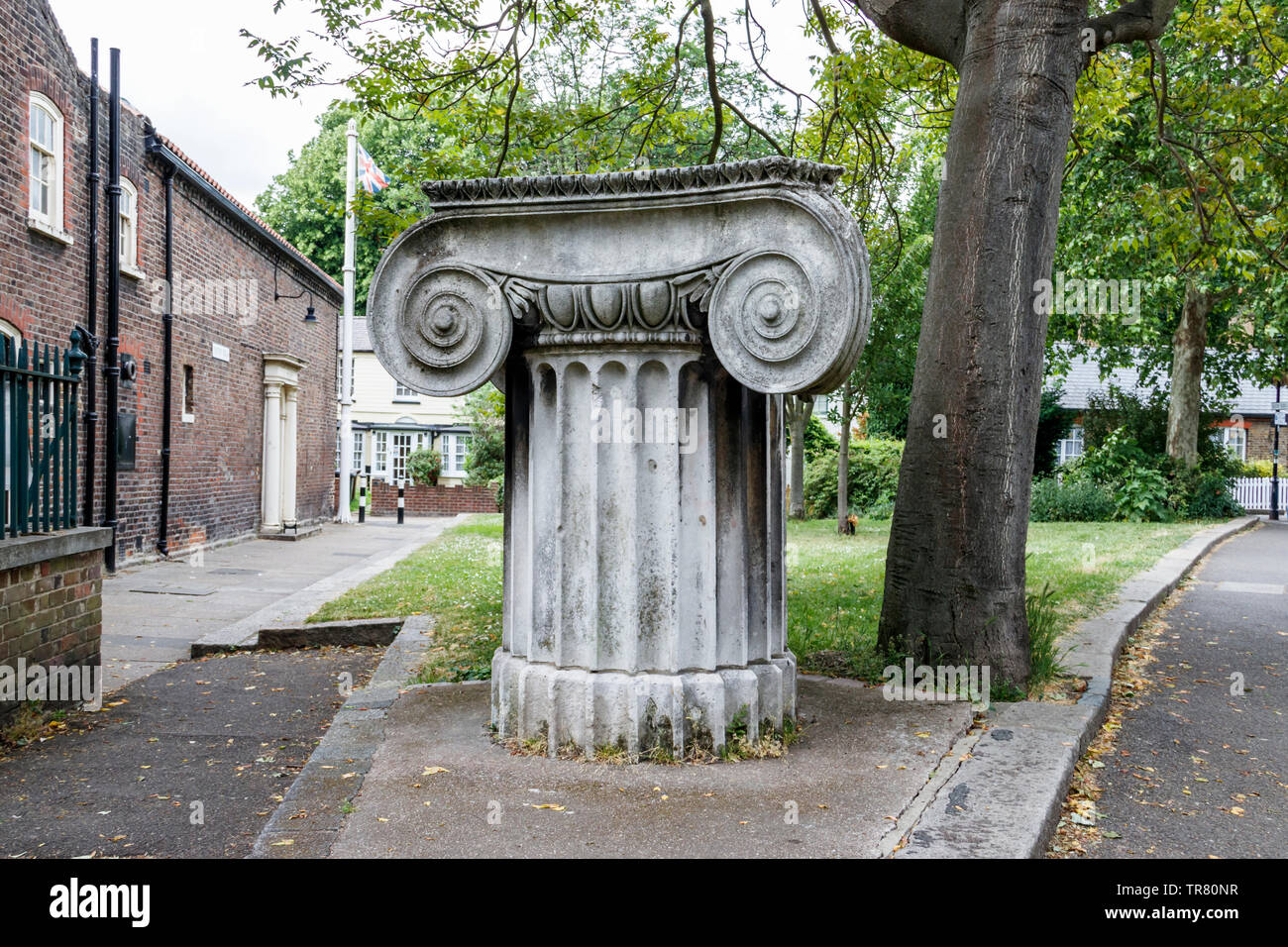 The capital of an ionic pillar outside Vestry House museum in Church Lane, Walthamstow, London, UK Stock Photo