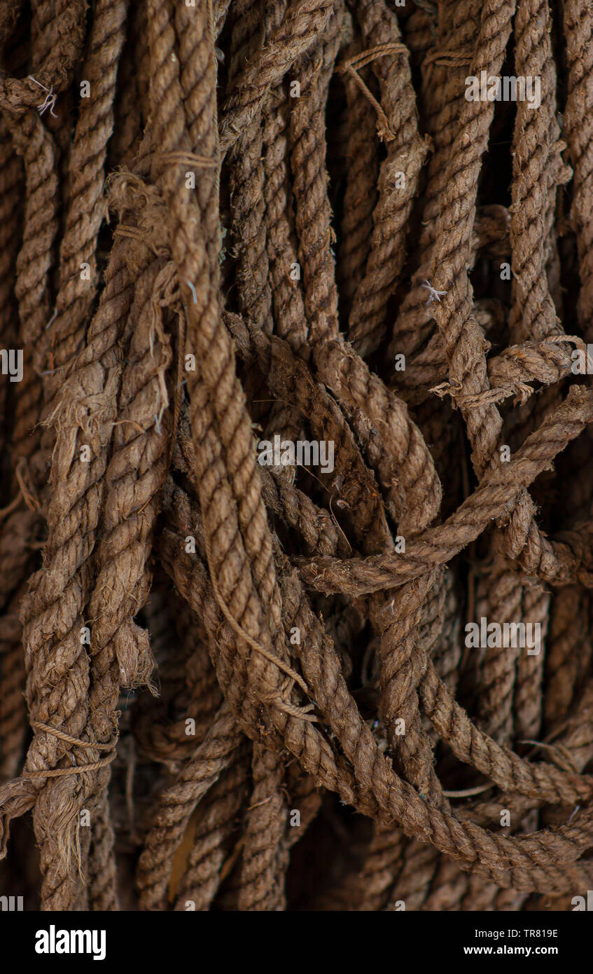 Old, brown ropes used for fishing nets Stock Photo - Alamy