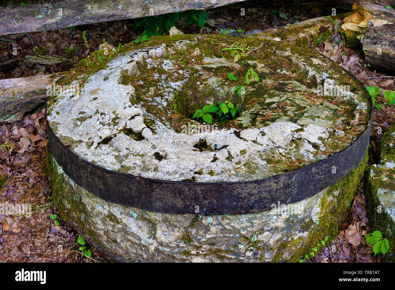 Close up of an old grist mill stone in Cades Cove Tennessee Stock Photo