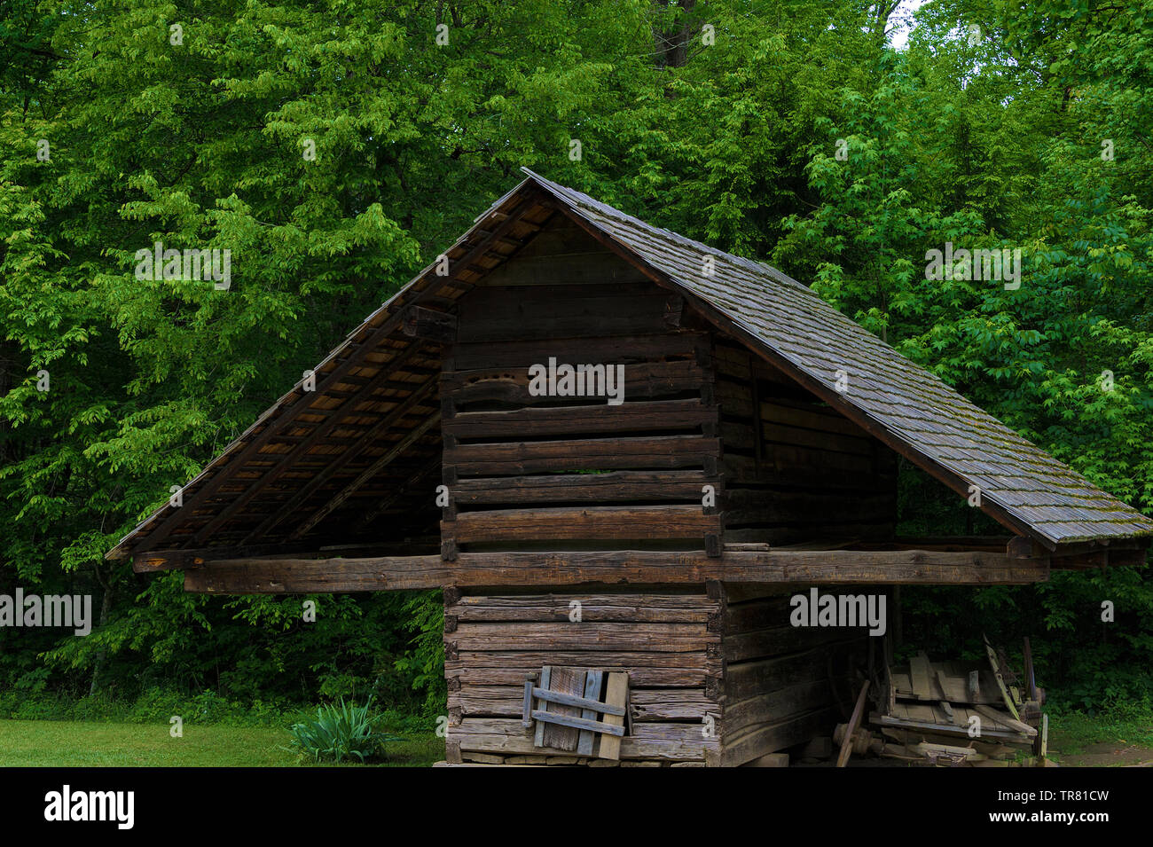 Wooden hand built structure by early settlers in Cades Cove Valley in the Great Smoky Mountains. Stock Photo