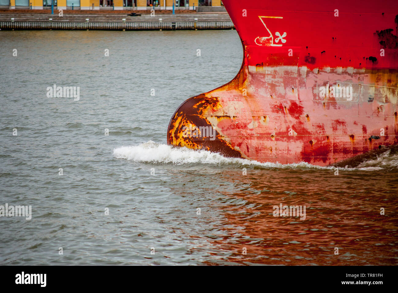 The bulb and bow of a red ship. Stock Photo