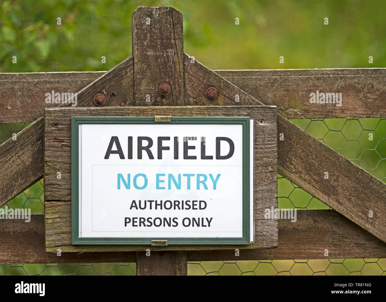 Airfield warning sign on a wooden gate at an airfield near Forfar