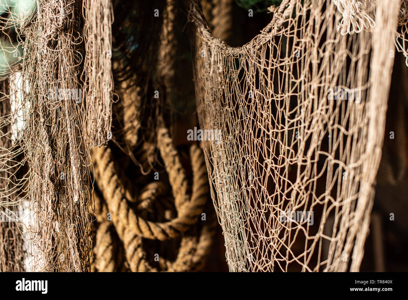 Vintage ropes and nets used in fishing a long time ago Stock Photo - Alamy