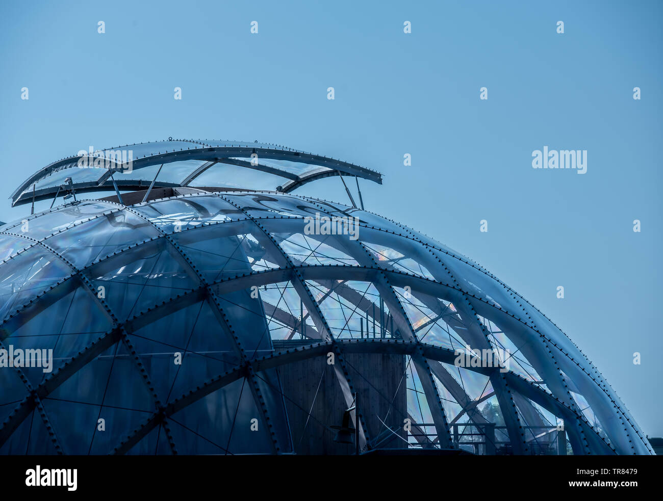 A house with a round glass roof Stock Photo - Alamy